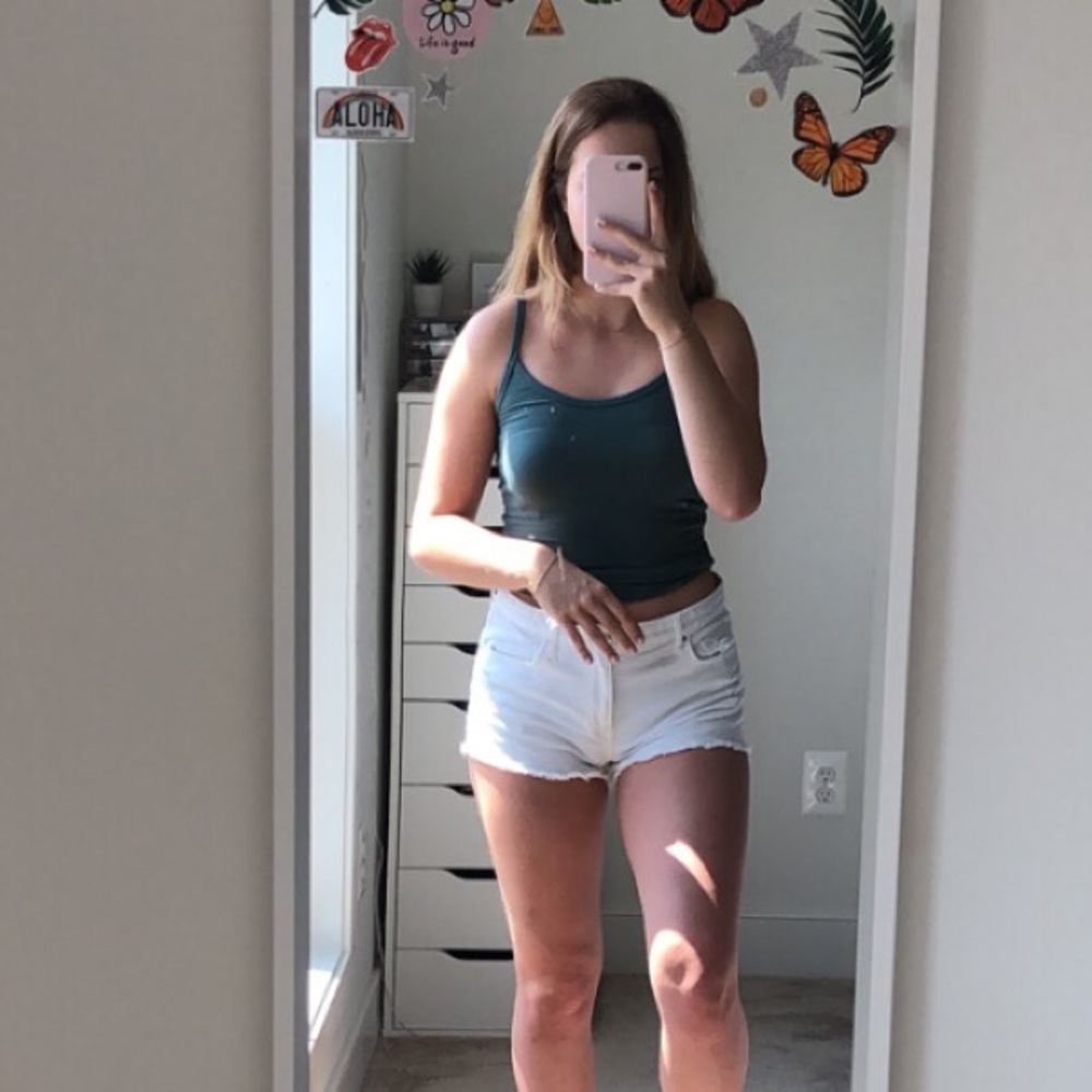 white slightly distressed denim shorts